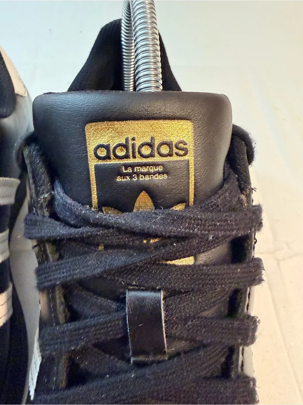 adidas Kids Black Sneakers with White Stripes and Gold Logo